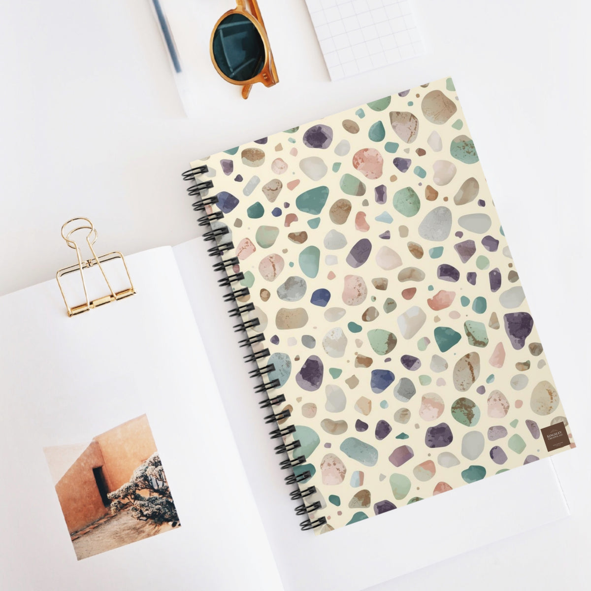 Scattered Sea Pebbles — Spiral Notebook