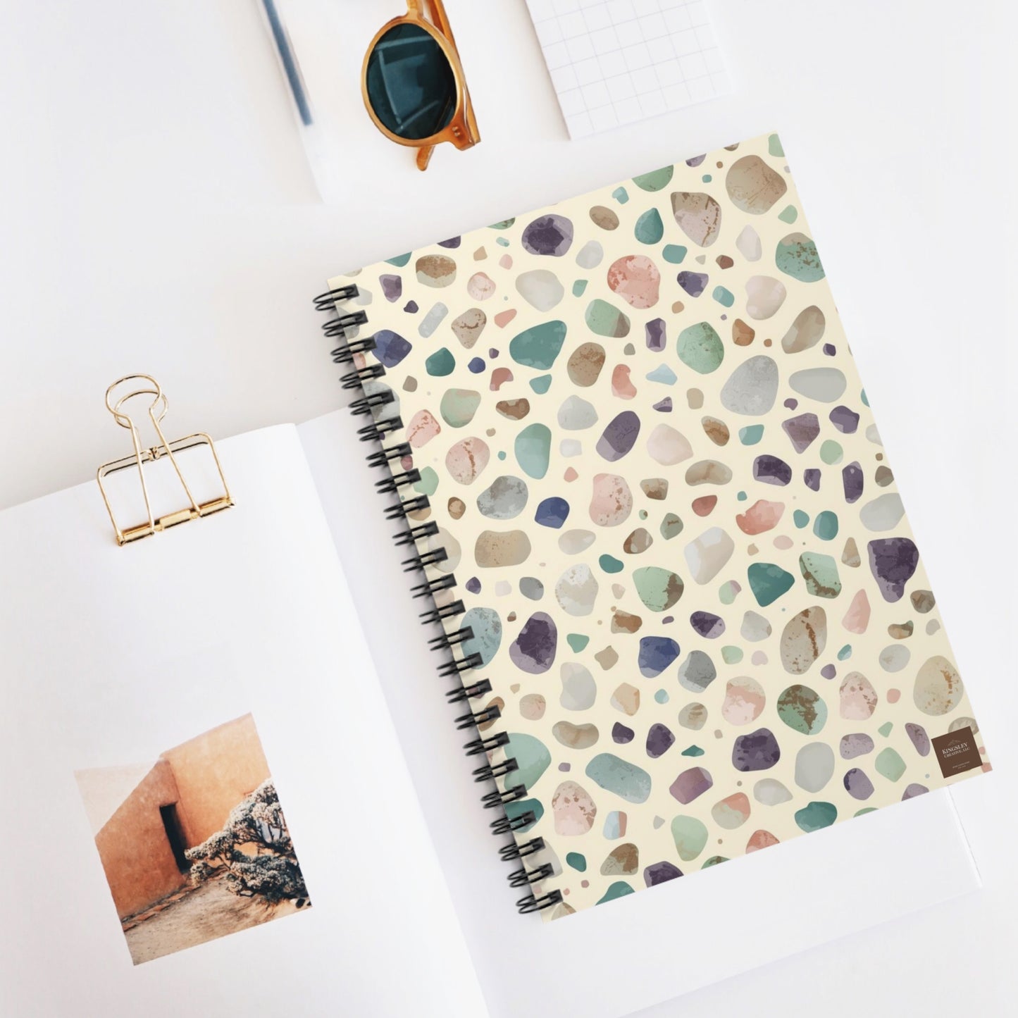 Scattered Sea Pebbles — Spiral Notebook